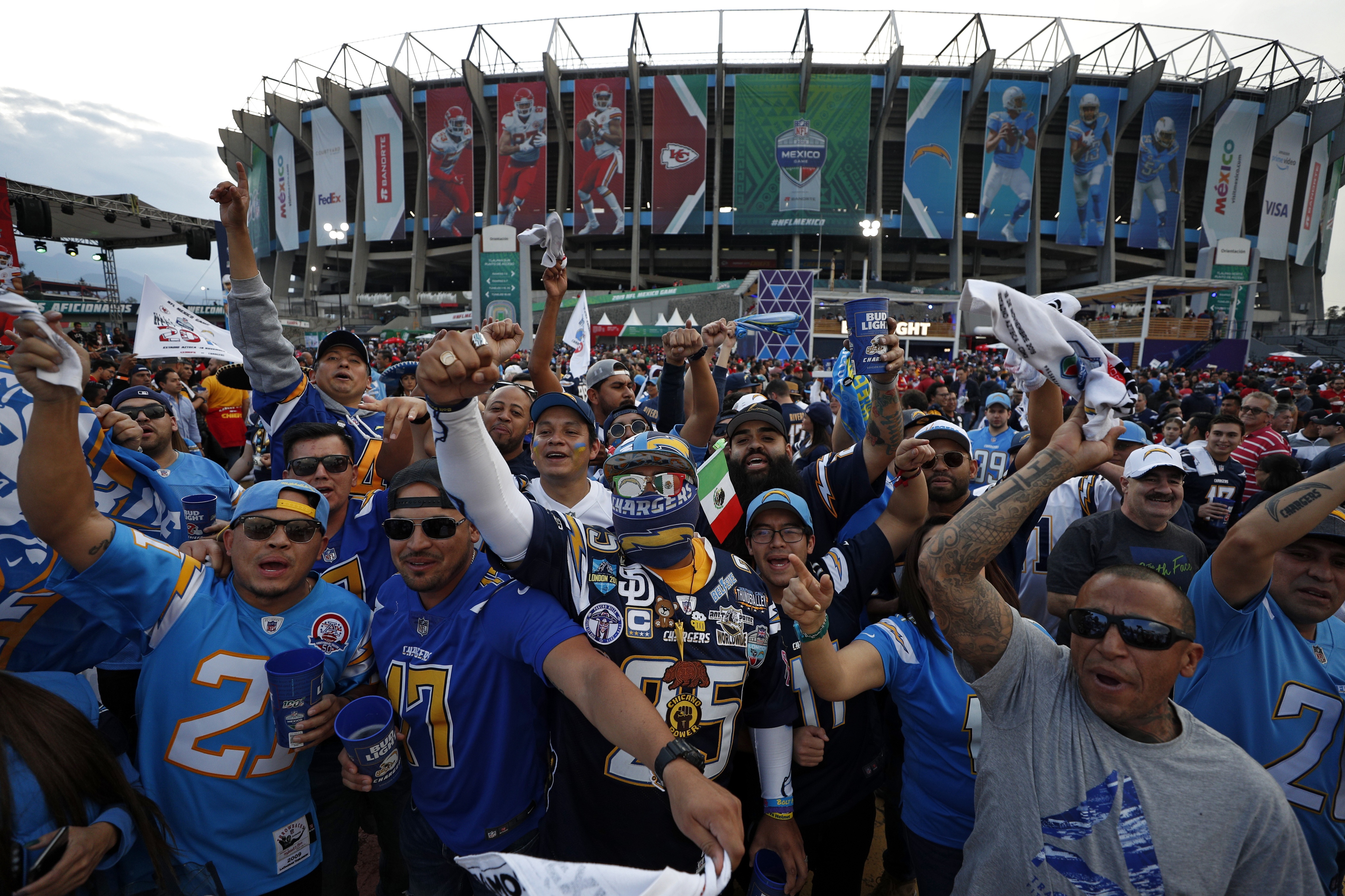 Fans cheer before an NFL football game between the Los Angeles Chargers and the Kansas City Chiefs in Mexico City in 2019. The NFL plans to play as many as eight international games beginning next season. The NFL