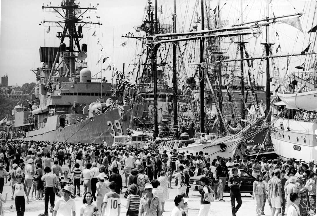 Crowds filled a pier at New York Harbor to see an international parade of tall ships as part of the bicentennial celebrations in July 1976.