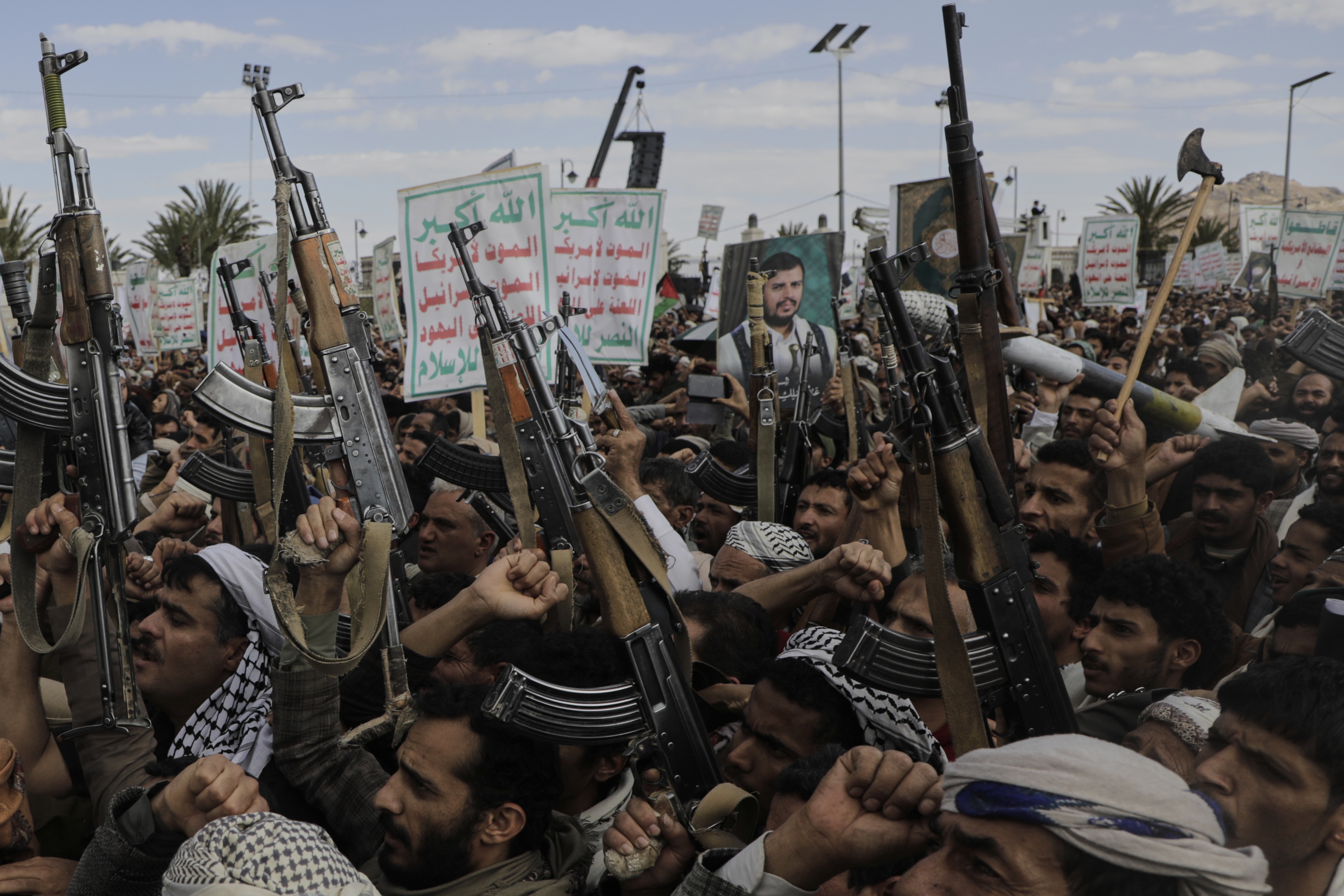 Houthi supporters chant slogans and hold pictures of Abdul Malik al-Houthi, the leader of the Houthi movement, during an anti-U.S. and anti-Israel rally in Sanaa, Yemen, Monday, March 17, 2025. (AP)