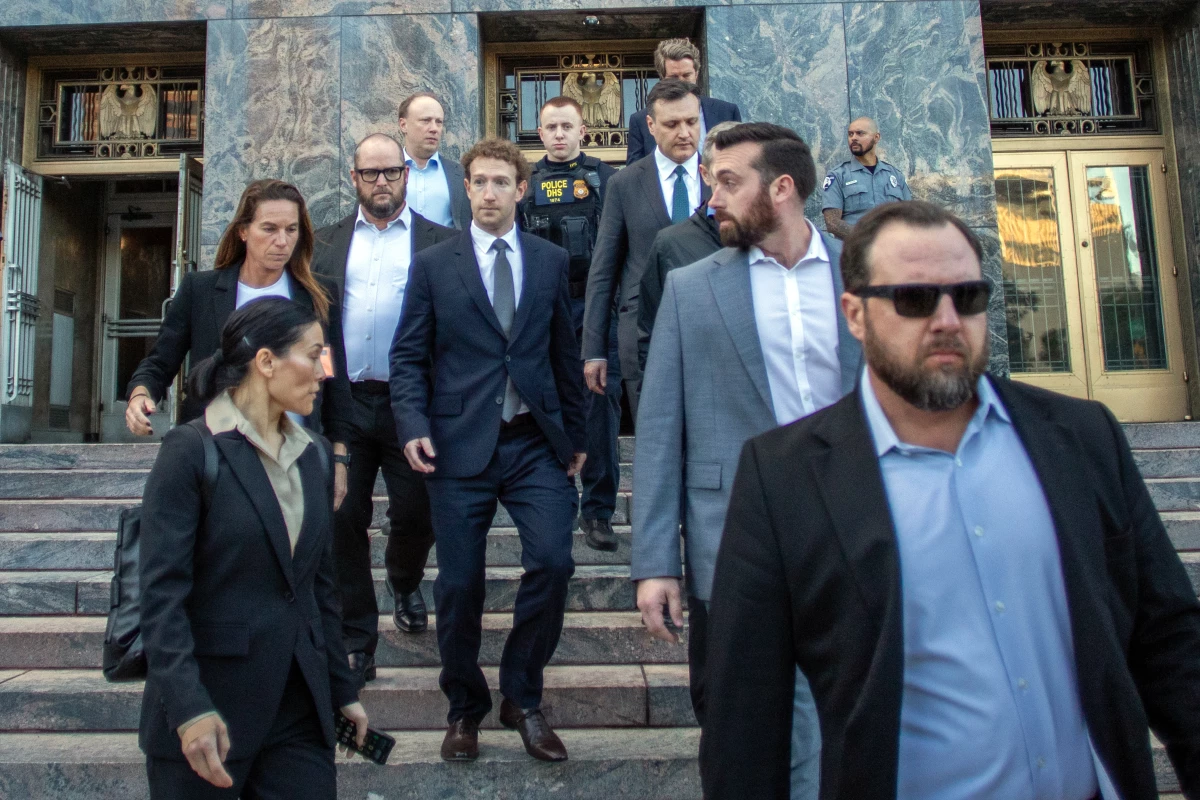 Meta CEO and Chairman Mark Zuckerberg (center) leaves the Los Angeles Superior Court after testifying in the social media trial on Feb. 18, 2026.
