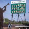 A man walks past a billboard with portraits of G20 leaders at the entrance for the Nov. 22nd G20 Leaders Summit. The meeting of the Group of twenty heads of state will convene in Johannesburg, but the U.S. will not be attending
