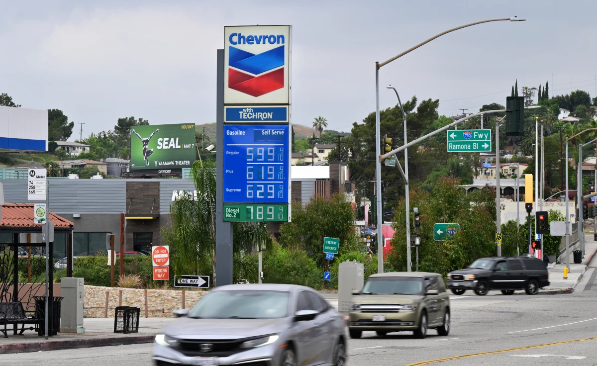 Gas prices are displayed at a Chevron gas station in Los Angeles on March 31.