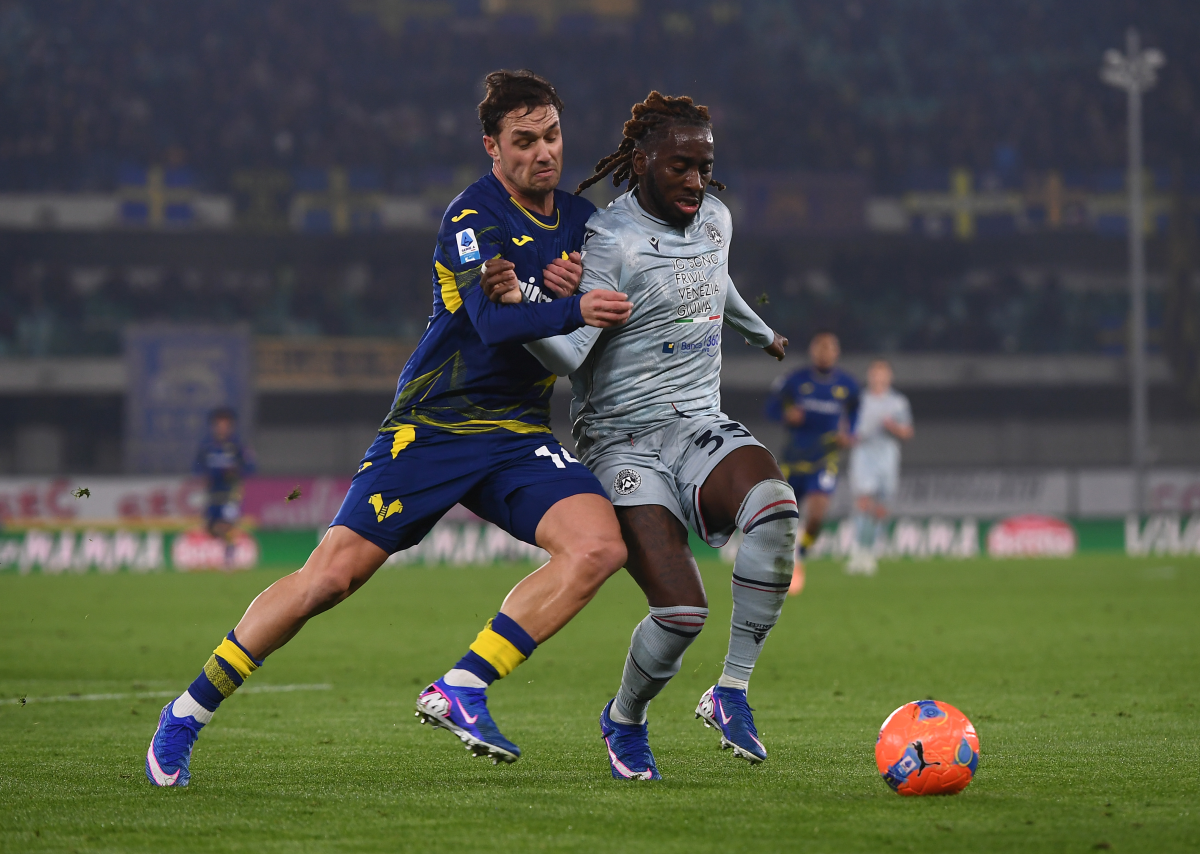 Jordan Zemura of Udinese Calcio is challenged by Pol Lirola of Hellas Verona during the Serie A match between Hellas Verona FC and Udinese Calcio at Stadio Marcantonio Bentegodi on Jan. 26, 2026 in Verona, Italy.