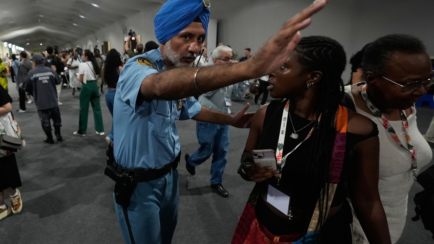 Fire prompts evacuations at U.N. climate talks in Brazil; 13 suffer smoke inhalation