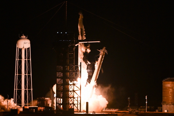 A SpaceX Falcon 9 rocket with the Crew Dragon Resilience capsule, carrying the crew of the Polaris Dawn Mission, lifts off from Launch Complex 39A at Kennedy Space Center in Cape Canaveral, Florida, on Tuesday.