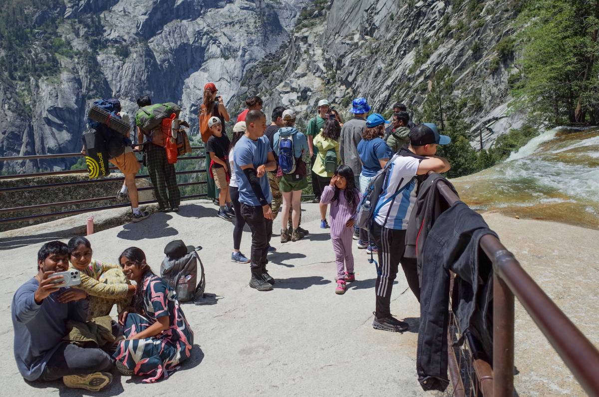 On May 18, visitors took photos at a viewing point above Vernal Fall, a waterfall at Yosemite National Park.