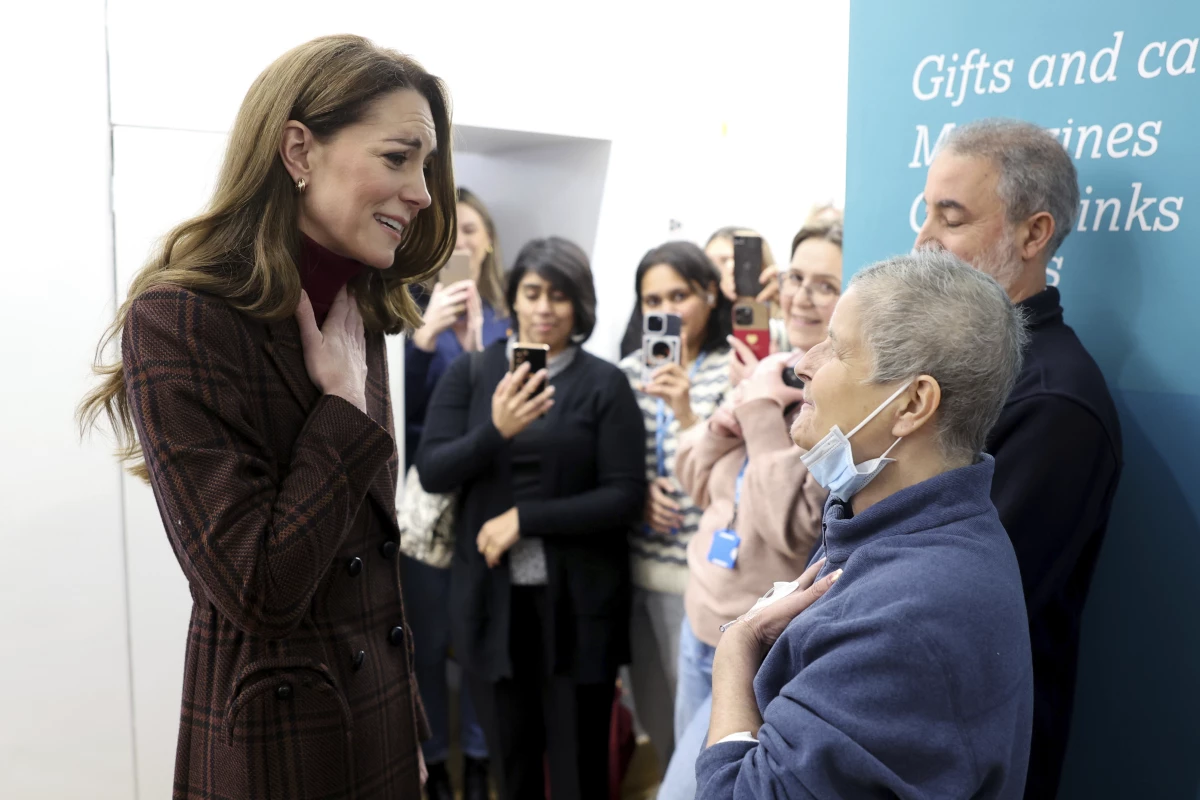 Britain's Princess Kate (left) talks with Rebecca Mendelhson during a visit to The Royal Marsden Hospital in London on Tuesday.