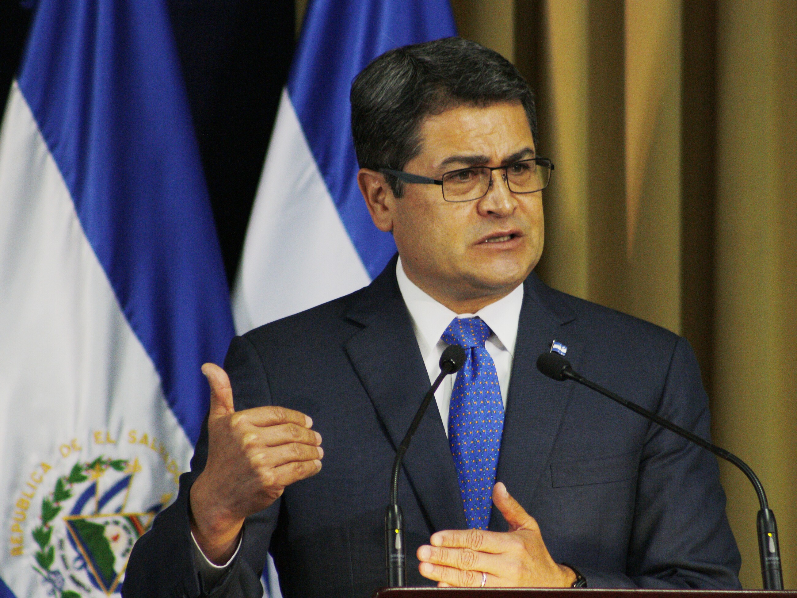 Then-Honduran President Juan Orlando Hernandez gives an speech in San Salvador, El Salvador.