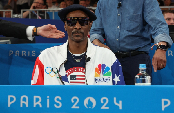 Rapper Snoop Dogg attends a judo competition at the Champ-de-Mars Arena in Paris.
