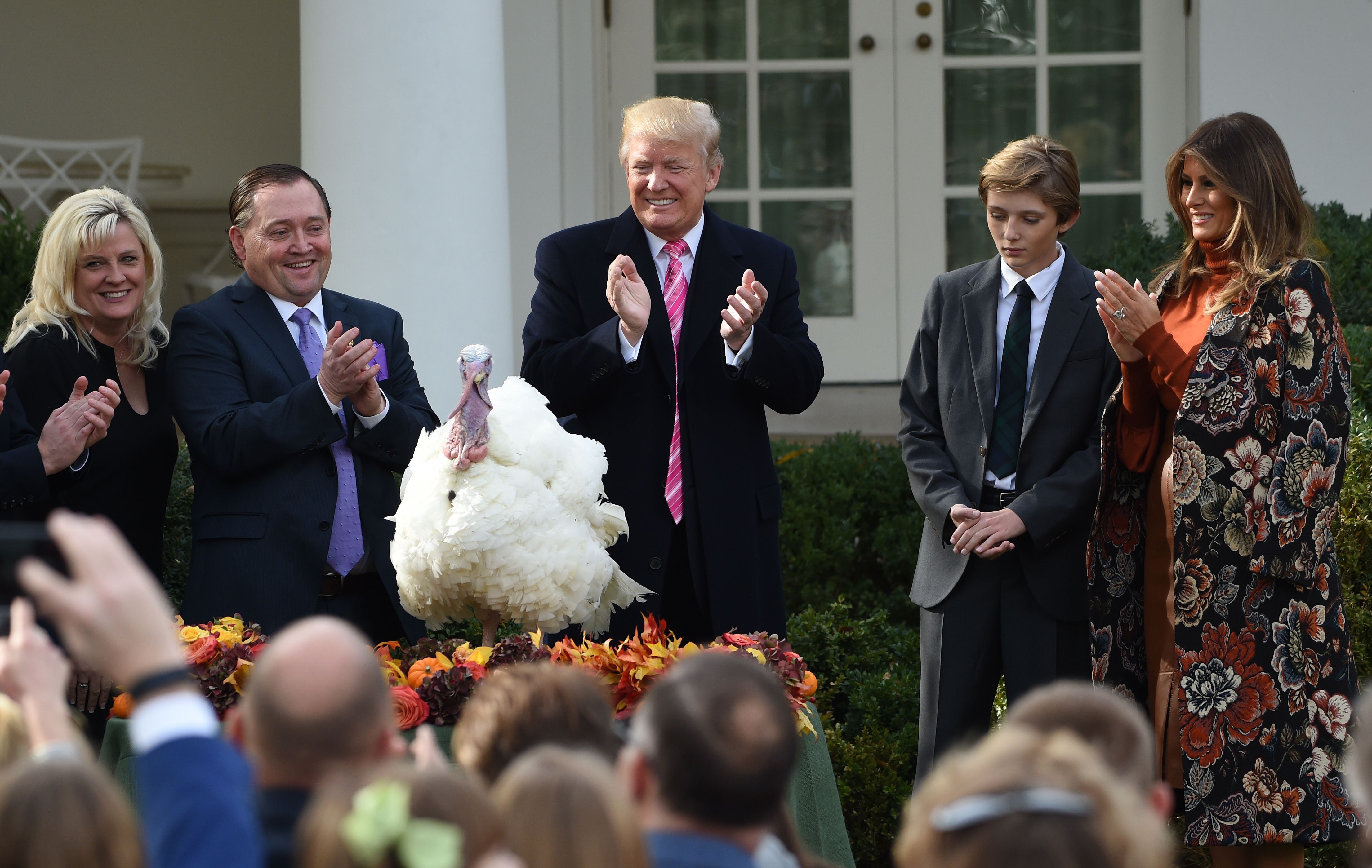 President Trump pardons Drumstick first lady Melania Trump and their son, Barron, look on at the White House on Nov. 21, 2017.