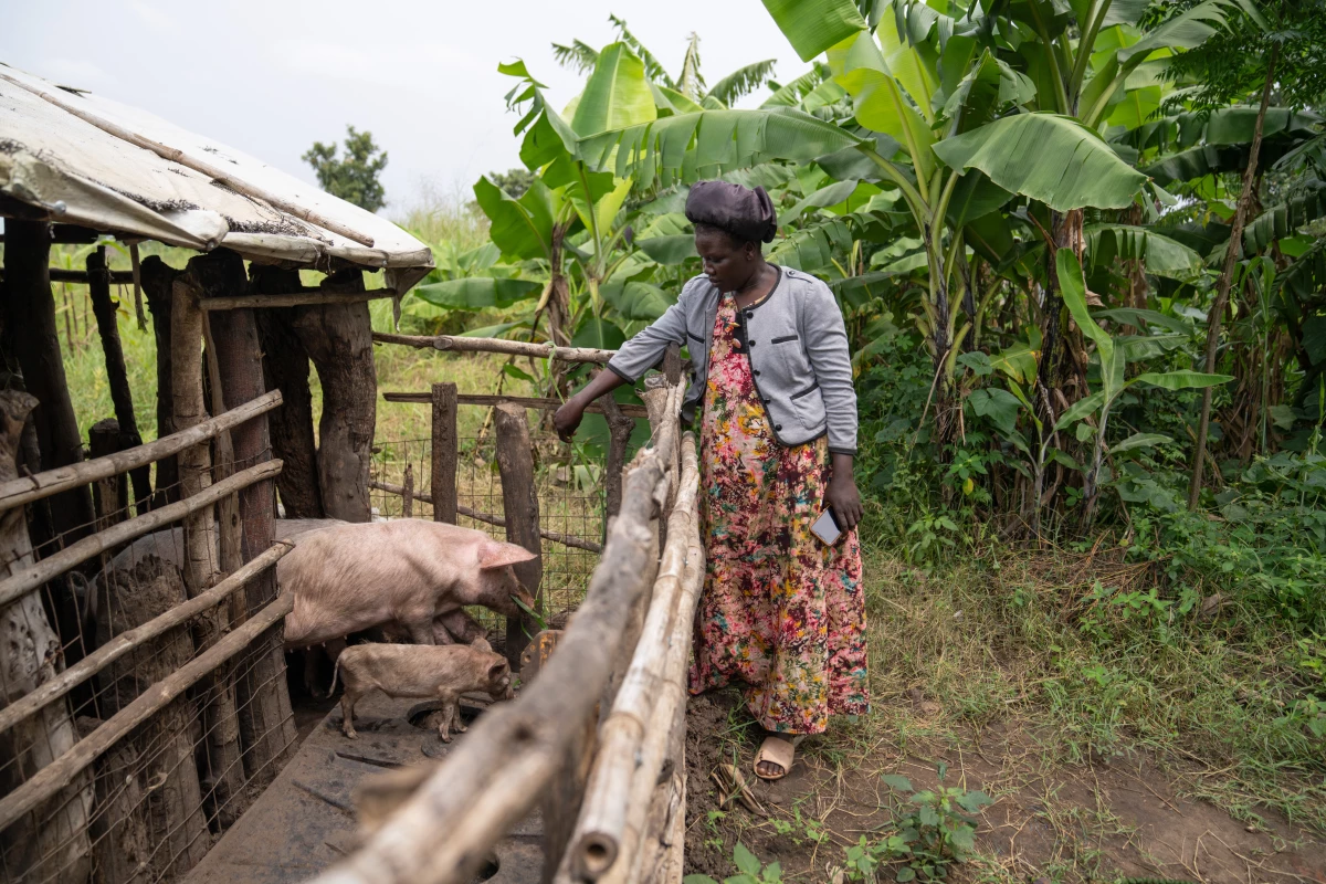 Florence Amungo, 34, a refugee from South Sudan, now lives at Palabek Refugee Settlement in Northern Uganda. Amungo was enrolled in a program to help people 'graduate' from poverty — then found out the program was cut. She had hoped to raise pigs to support her household of 14 people — her husband, their five biological children and other children that she cares for.