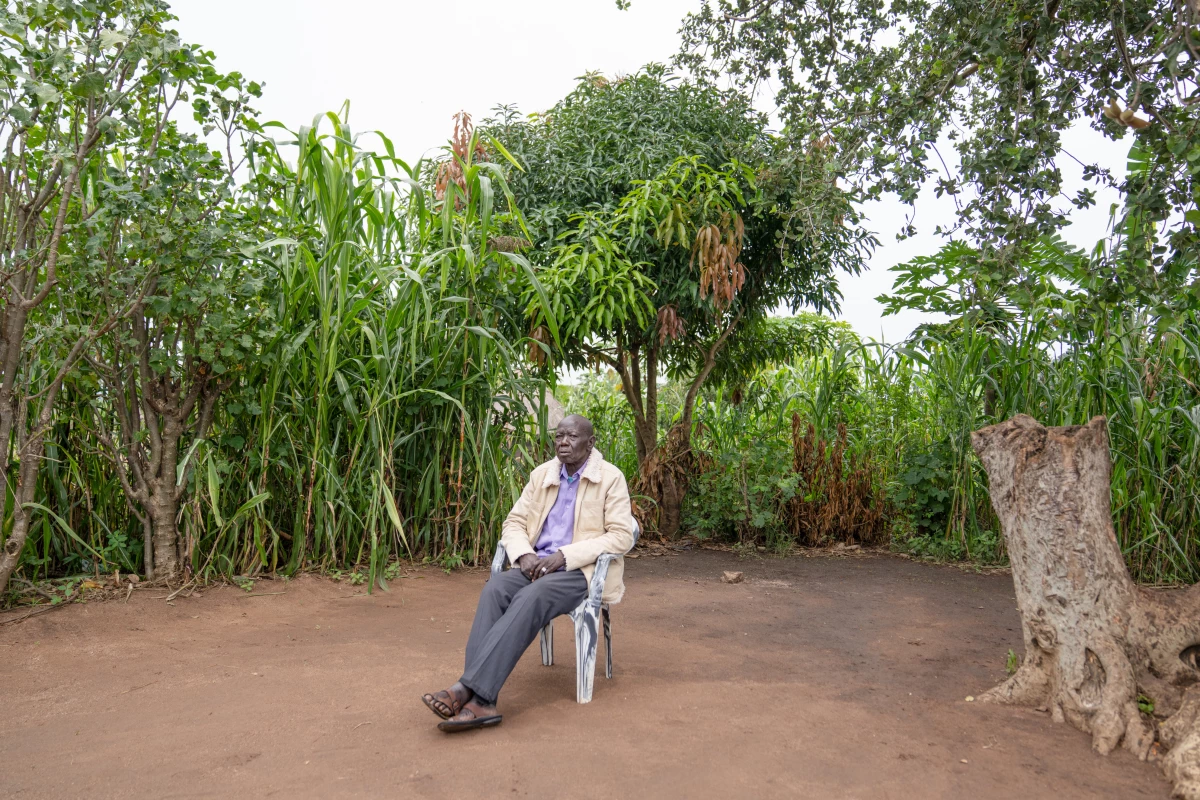 Akim Joseph Yanga, 63, is a refugee from Juba in South Sudan and a village leader in the Palabek Refugee Settlement in Northern Uganda. He was also set to be a participant in the USAID-funded program to lift people out of poverty. He'd hoped to start a livestock business.