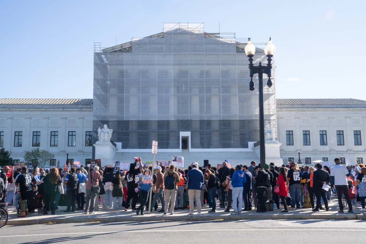 People gather  in support of minority voting rights outside the U.S. Supreme Court in Washington, D.C., on Wednesday.