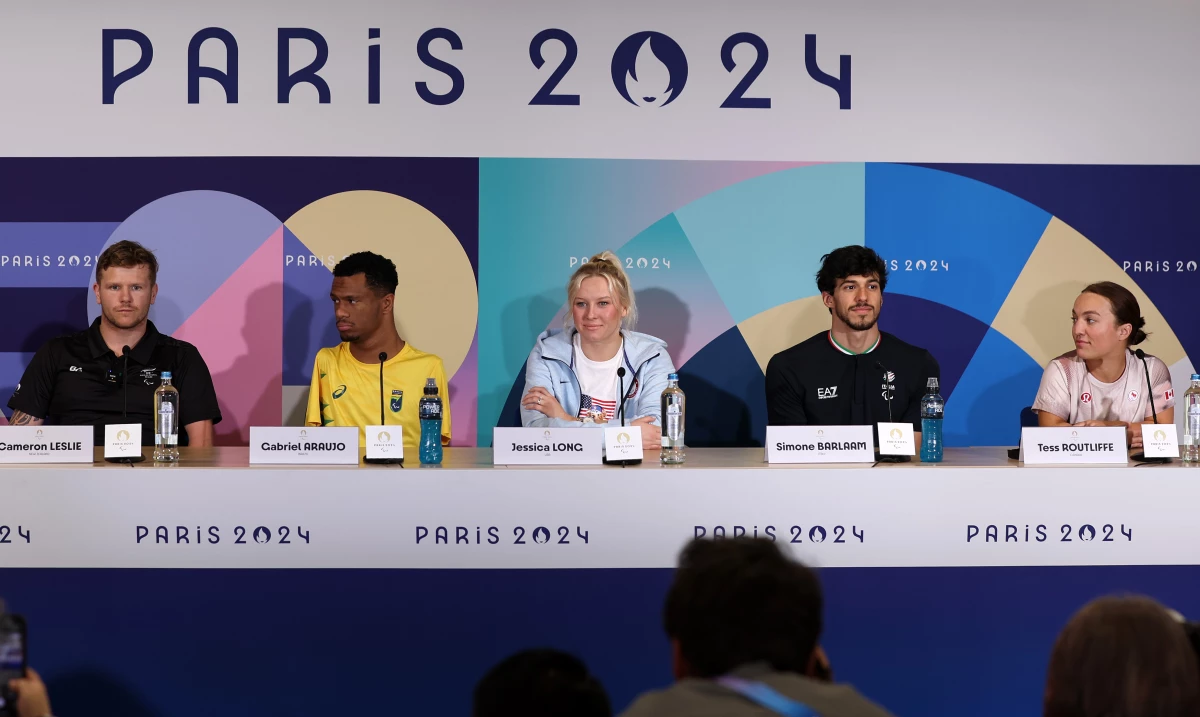 From left, swimmers Cameron Leslie of New Zealand, Gabriel Araujo of Brazil, Jessica Long of the U.S., Simone Barlaam of Italy and Tess Routliffe of Canada speak at a press conference in Paris on Tuesday.