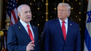 President Donald Trump listens as Israel's Prime Minister Benjamin Netanyahu speaks at President Donald Trump's Mar-a-Lago club, Dec. 29, 2025, in Palm Beach, Fla.