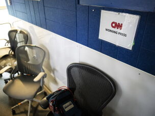 WASHINGTON, DC - SEPTEMBER 19: A CNN sign hangs on the wall behind the broadcast area in the White House briefing room, on September 19, 2026 in Washington, DC.