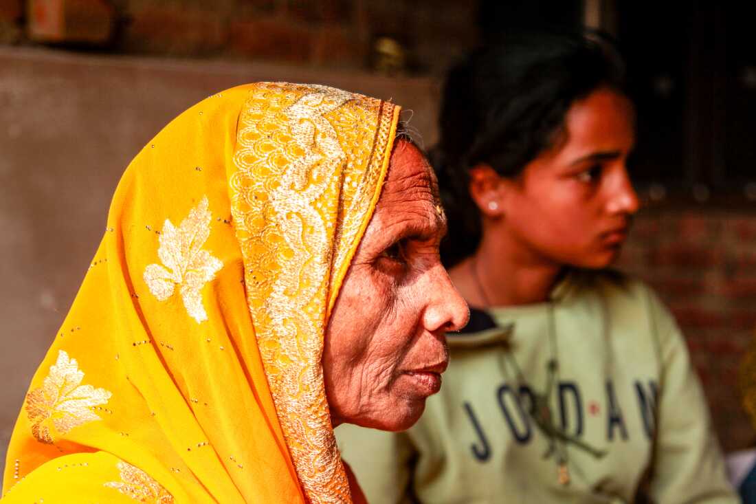 The mother of a young man whose death formed the backbone of an Oscar-nominated movie, “Homebound,” on a recent day in their hometown, the northern Indian village of Devari. The movie is based on an a New York Times essay, which told the backstory of an image that went viral during the pandemic in India. The image showed Mohammad Saiyub, a Muslim, cradling his best friend, Amrit Kumar, a Dalit Hindu, on a dusty roadside. Kumar is clearly unwell. The two were there because Kumar was kicked off a truck they were hitching a ride on to get home, nearly 1,000 miles away. The photo initially drew viewers attention because of its tender portrayal of friendship of two Indian migrant workers. It drew attention because it showed the price of the Indian government’s decision to halt most industry and transport in the early days of the pandemic, which led to millions of migrant workers going hungry, and who tried to walk and hitch home, sometimes hundreds of miles away. And then it drew attention because it was the men were Hindu and Muslim, in a country where communal relations have been polarized after a decade of Hindu nationalist rule. Kumar, a Hindu, died shortly after the photo was taken.