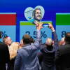 AfD supporters celebrate with a sign featuring top candidate Ulrich Siegmund after the first results of the Saxony-Anhalt state election at the party’s election night gathering in Magdeburg, Germany, Sunday, Sept. 6, 2026.