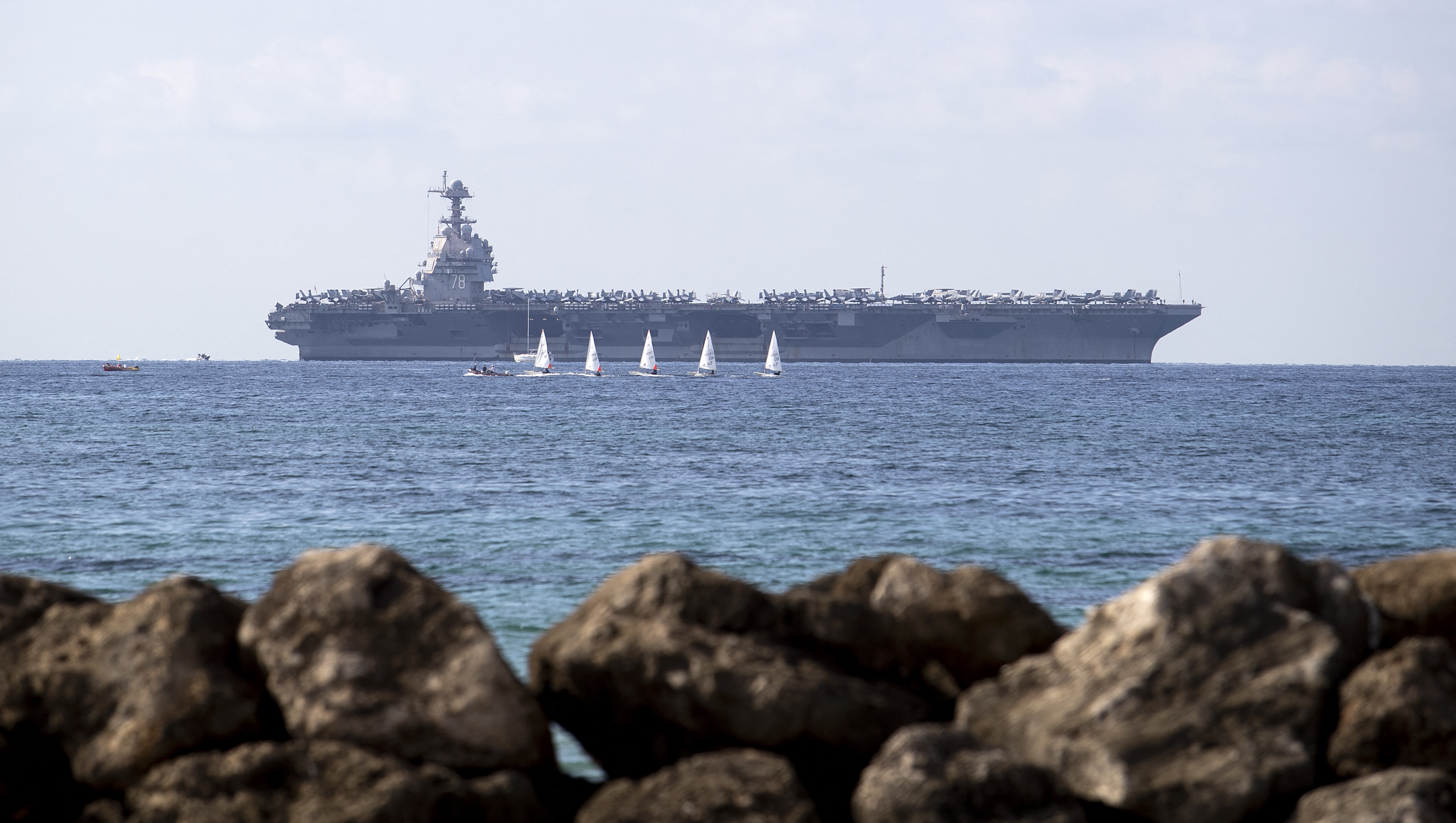 The USS Gerald R. Ford is anchored in the Bay of Palma after arriving to Spain's Palma de Mallorca on Oct. 3, 2025. The world's largest aircraft carrier is due to arrive in the northern Caribbean on Sunday as tensions with Venezuela grow. (AFP via Getty Images)