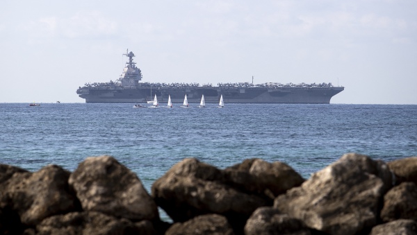 The USS Gerald R. Ford is anchored in the Bay of Palma after arriving to Spain's Palma de Mallorca on Oct. 3, 2025. The world's largest aircraft carrier is due to arrive in the northern Caribbean on Sunday as tensions with Venezuela grow.