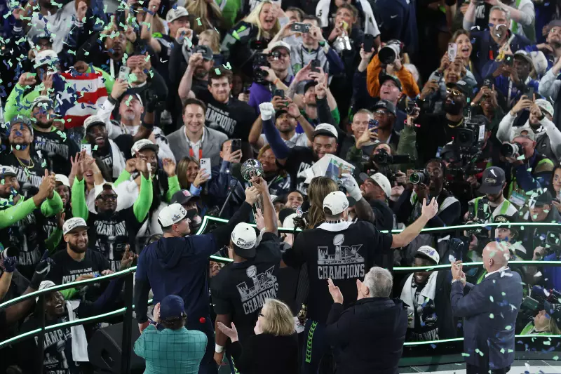 The Seattle Seahawks celebrate with the Vince Lombardi Trophy after winning Super Bowl LX against the New England Patriots at Levi's Stadium on February 8, 2026 in Santa Clara, Calif.