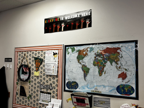 An “Everyone is Welcome” sign hangs in Sarah Inama's classroom.