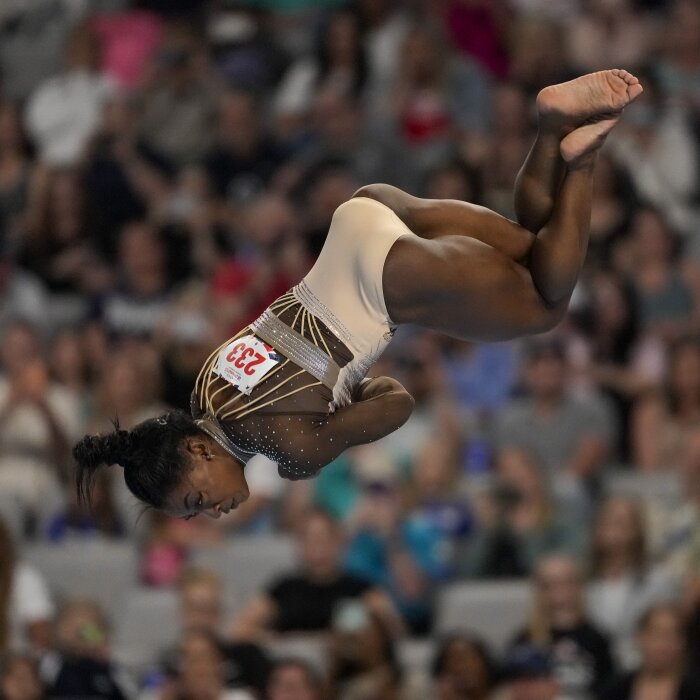 Simone Biles performs floor exercises during the U.S. Gymnastics Championships on Sunday in Fort Worth, Texas. (AP Photo/Julio Cortez)