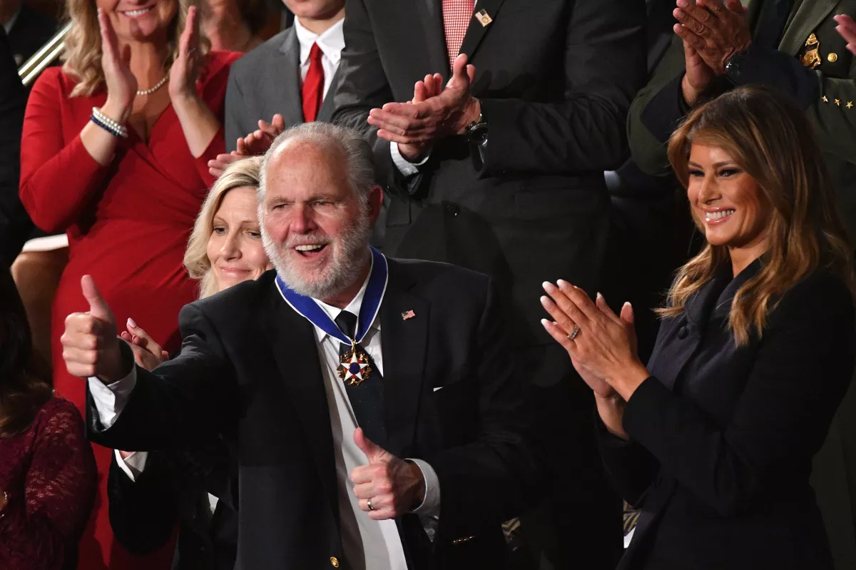 Radio personality Rush Limbaugh gives a thumbs-up after being awarded the Medal of Freedom during President Trump's 2020 State of the Union address.