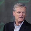 NCAA president and former Massachusetts governor Charlie Baker is interviewed by Boston Globe Sports writer Chris Gasper at the Globe Summit 2023.