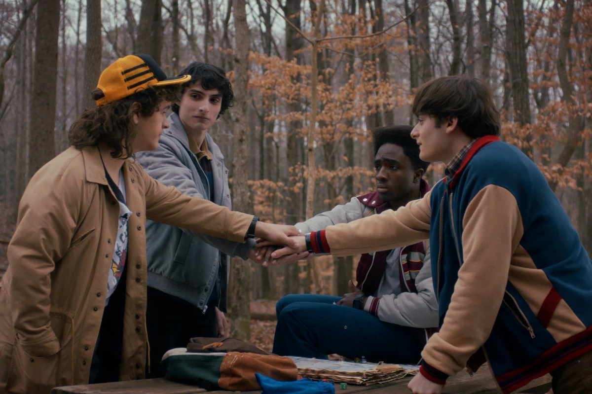 The first batch of episodes in Stranger Things' final season are out on Wednesday. Above: Gaten Matarazzo as Dustin Henderson, Finn Wolfhard as Mike Wheeler, Caleb McLaughlin as Lucas Sinclair, and Noah Schnapp as Will Byers.