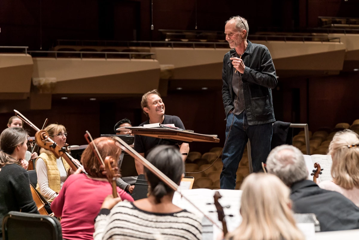 Adams rehearses Become Desert, with the Seattle Symphony and conductor Ludovic Morlot, at Benaroya Hall in Seattle for its 2018 world premiere.