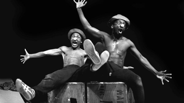 Performers Percy Mtwa, left, and Mbongeni Ngema in a scene from "Woza Albert" at the Market Theatre in Johannesburg, South Africa, in 1981.