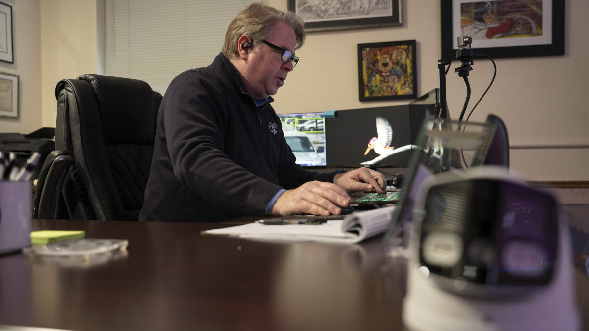 Bryan Lagarde, founder of Project NOLA, monitors crime camera feeds from his desk at the nonprofit's headquarters on the campus of the University of New Orleans in New Orleans on Dec. 4.