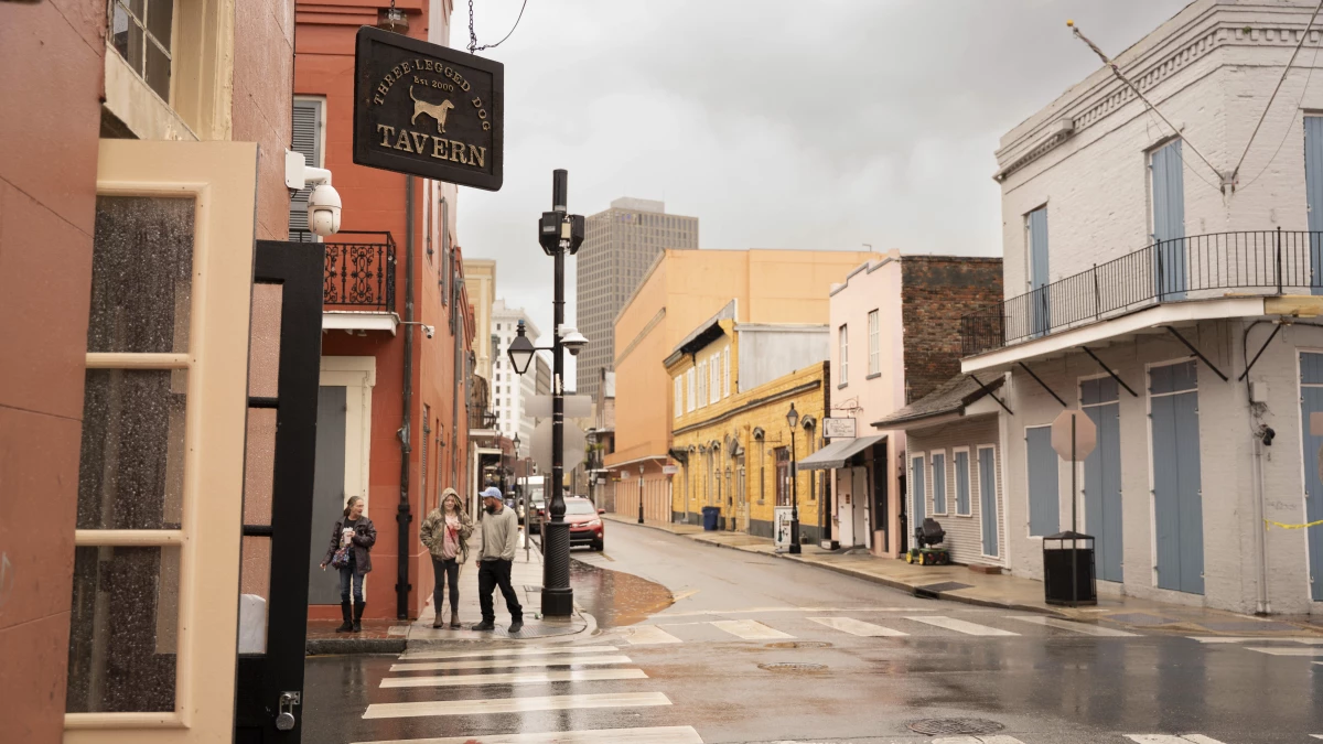 Cameras mounted outside the Three Legged Dog in New Orleans' French Quarter scan the faces of passersby on Dec. 4, 2025. The devices use facial recognition technology to search for violent offenders and outstanding warrants, though most people walking past remain unaware of the surveillance.