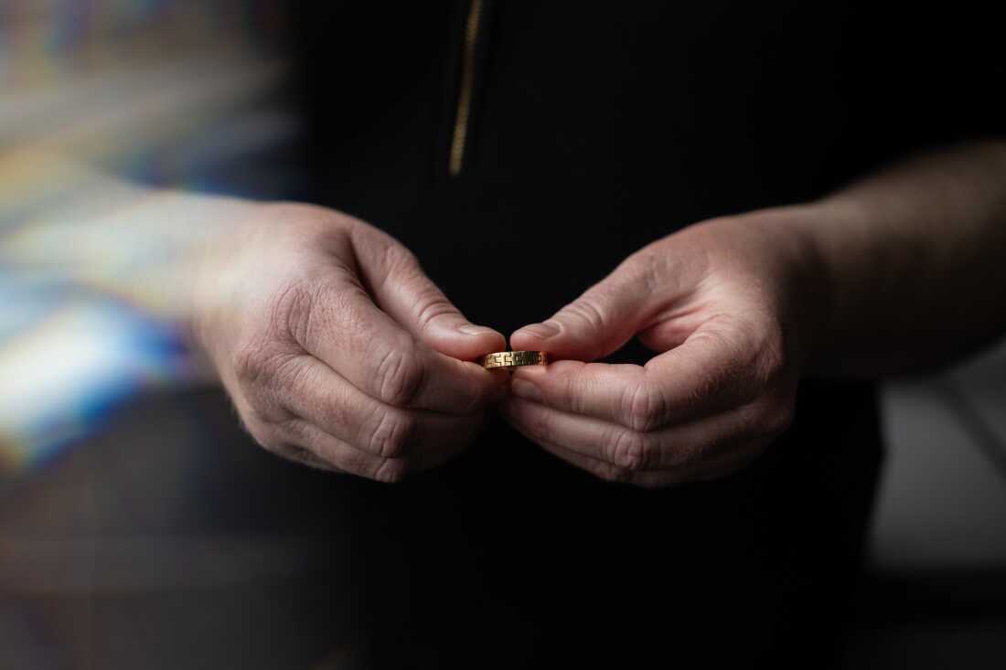 Mara holds her favorite anchor ring, which carries the inscription, "God for me provide be."