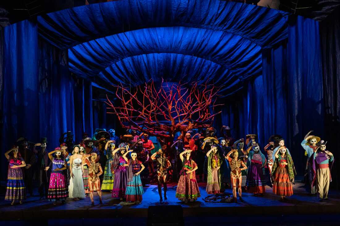 In director Deborah Colker's vision for the opera, chorus members wear death masks.