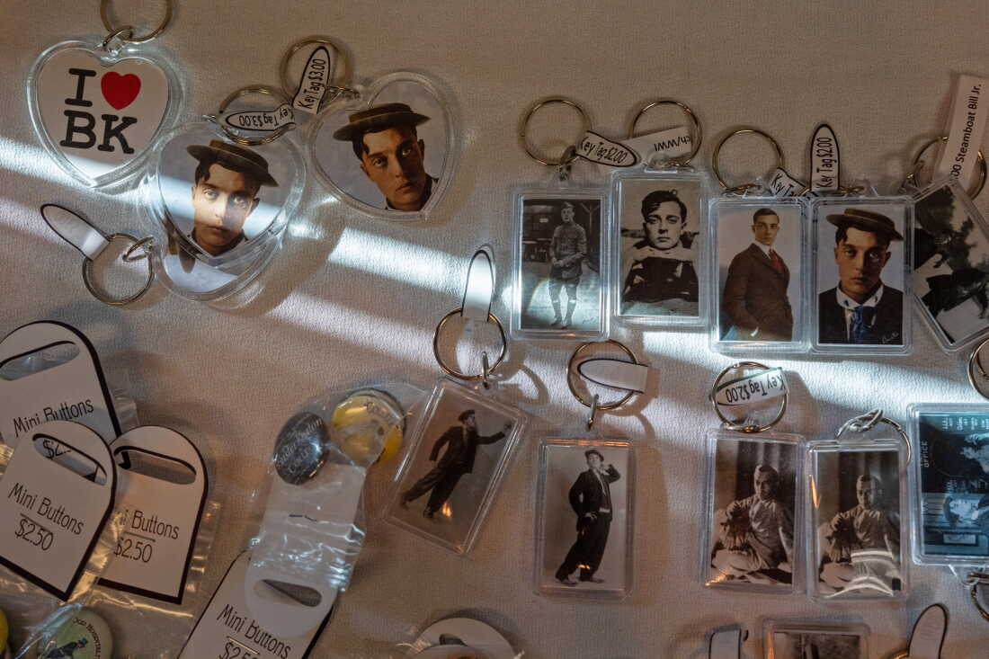 Buster Keaton keyrings and other souvenirs on display at the 2026 Buster Keaton Conference in Cottage Grove, Ore., on Saturday, Aug. 29, 2026. (Krista Rossow for NPR)