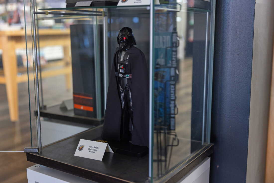 A foot-tall Darth Vader figurine is on display. Foot-tall action figures were tariffed at 145% one point.
