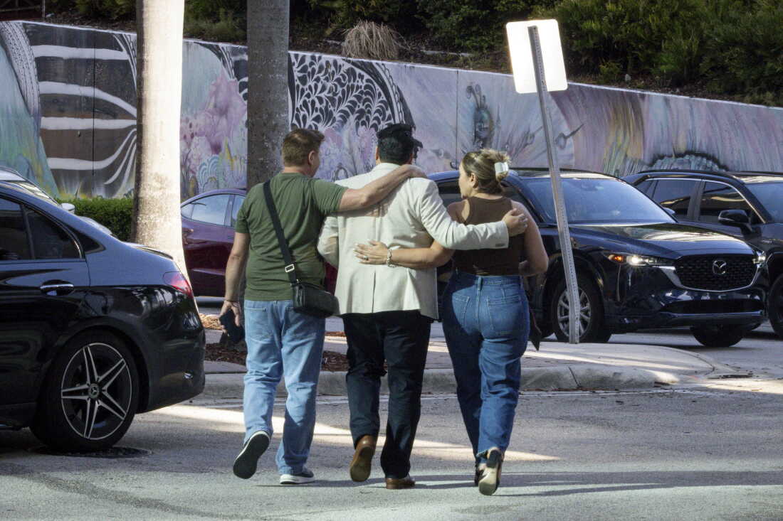 People embrace as they leave the Miami Immigration Court on Wednesday, Sept. 2, 2026 in Miami, Fla. Eva Marie Uzcategui for NPR