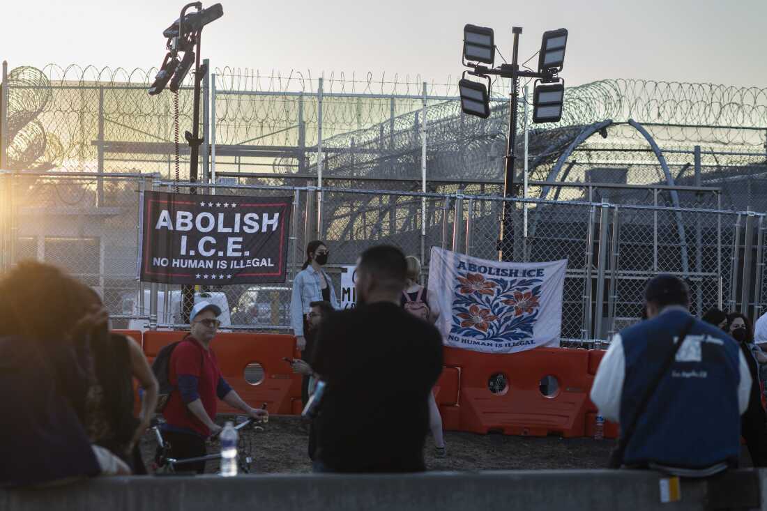 Protesters stand outside Delaney Hall detention center on June 3, 2026.