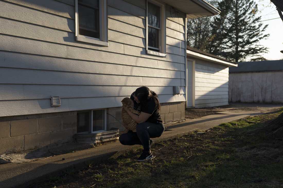 Paola, an Ecuadorean immigrant whose husband was deported in August 2025, went into hiding for two months during Operation Metro Surge. During the surge, Paola lost much of her income and fell behind on paying back her debts, including the thousands of dollars her family still owes to the smugglers who brought them into the U.S.