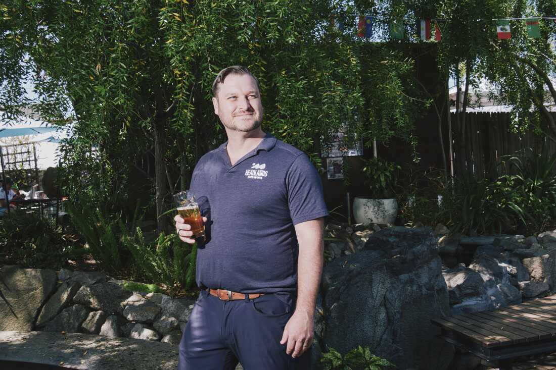 Headlands Brewing COO and Brewmaster Ryan Frank drinks a Common Ground beer in Berkeley, Calif. on June 11.