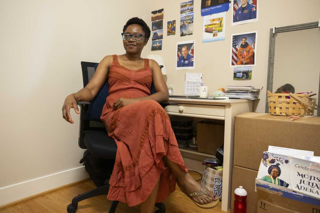 Funmilayo Erinfolami, a space physicist who is earning her PhD and does research at NASA, poses for a portrait in her room at Anne Montgomery House in Washington, D.C. on July 31, 2026. The community house that is closing after ten years was run by Society of the Sacred Heart, an international congregation of Roman Catholic religious women.