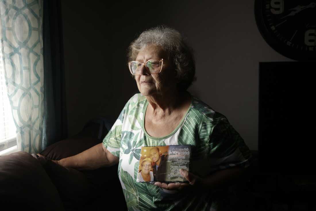 Cindy Leachman Aldridge holds a photo of her late grandson, Jonah Neal, at her home on Wednesday, July 12, 2026 in Owensboro, Ky. Neal was killed in May in Memphis, Tenn. by a federal agent from a crime-fighting task force that includes agents from Homeland Security Investigations and members of the Tennessee National Guard.