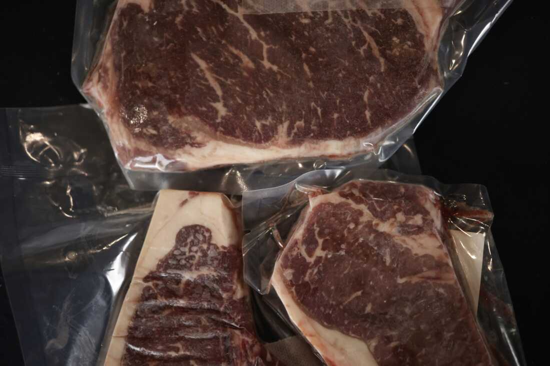 Cuts of beef raised by Hallstead Farms are seen in clear plastic packaging.
