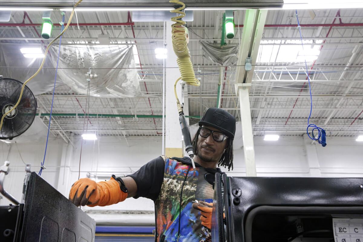 Kwame Crockett started working at Roper a few days a week to supplement his job managing properties in a mobile home park. He's now working full-time hours at the plant but is happy that he can take off time whenever he wants.