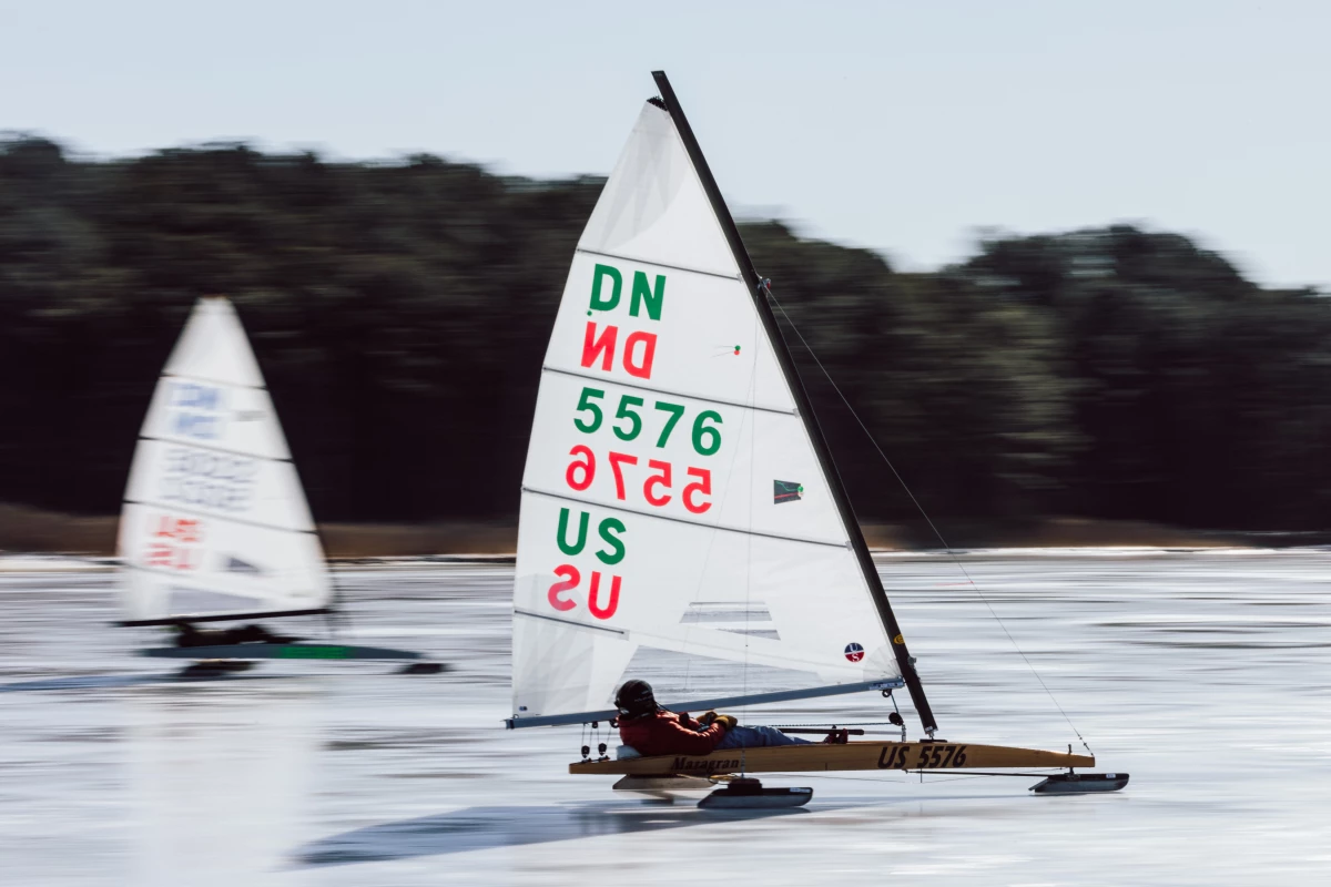 Ice boat racer and sailor, Ray Gauthier, 72, sails across the ice at Claiborne Cove, in Claiborne, Md., on Monday. The unusually long stretch of subfreezing temperatures created optimal conditions in an area where the water rarely freezes.