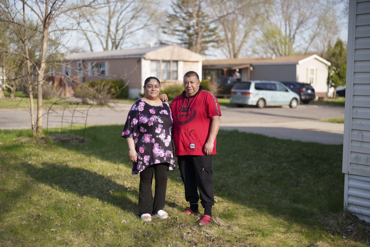 Husband and wife Pablo Alcaraz and Maria Peñalosa pose for a portrait outside their home in Inver Grove Heights, Minn. on April 22, 2026. The couple, who had to close their business Garibaldi Mexican Restaurant in West St. Paul after suffering dramatic revenue losses during Operation Metro Surge, have lost their only source of income.