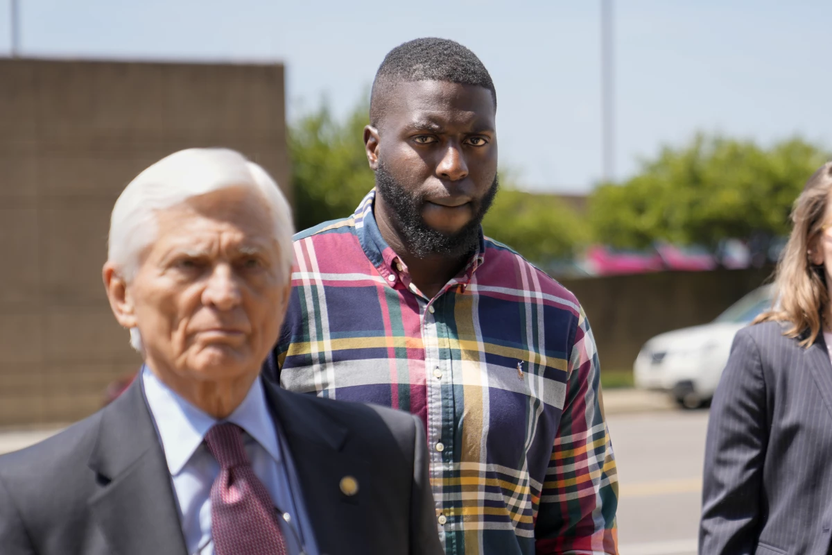 Emmitt Martin III, a former Memphis Police Department officer, second from left, accused of killing Tyre Nichols, walks into federal court on Friday in Memphis, Tenn.