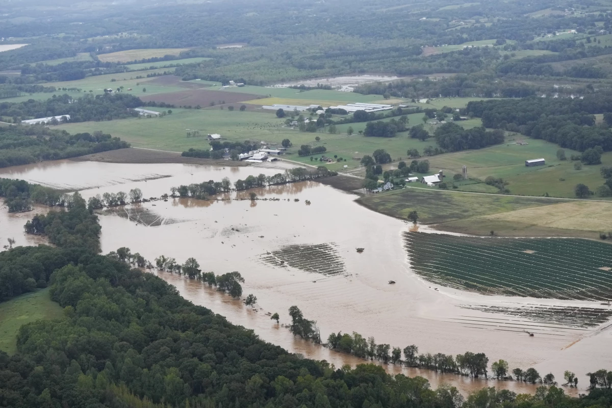 An aerial view shows flood damage left by Hurricane Helene along the Nolichucky River in norteastern Tennessee on Sept. 28. ecovery has been slow in the mountainous area of eastern Tennessee and western North Carolina.